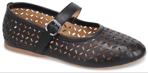 A black Mary Jane shoe with floral cutouts and a buckled strap.