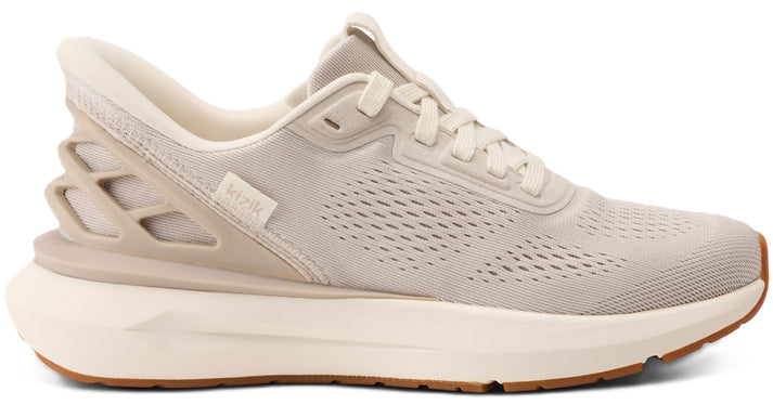 Tan running shoe with a mesh upper and a chunky white sole.