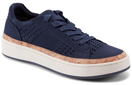 Low-profile navy blue casual sneaker with a cork midsole and white outsole.