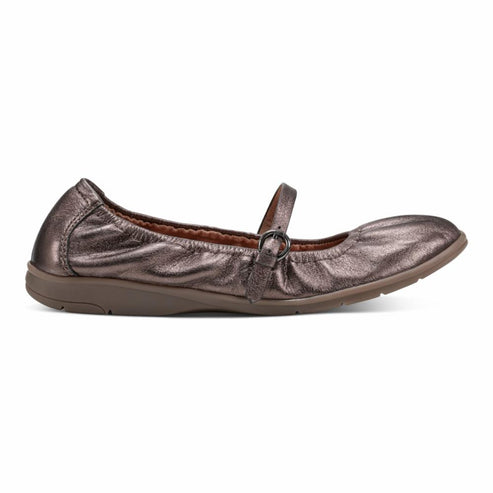 Bronze Mary Jane flat shoe with a buckle strap.