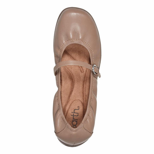 Top-down view of a leather ballet flat with a buckle strap.