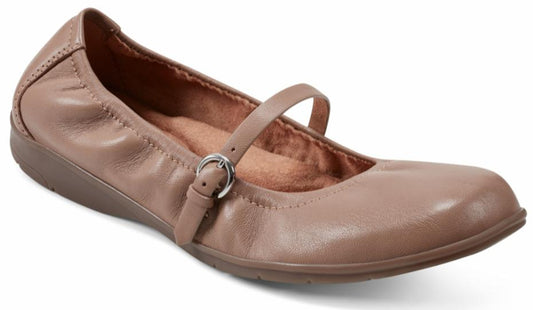 Closed toe dress shoe with a buckle strap.