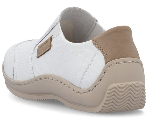 Slip-on white shoe with tan accent on heel and elastic band with tan label.