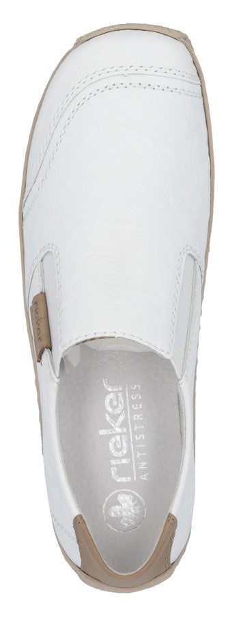 White slip-on shoe with tan sole and accent.
