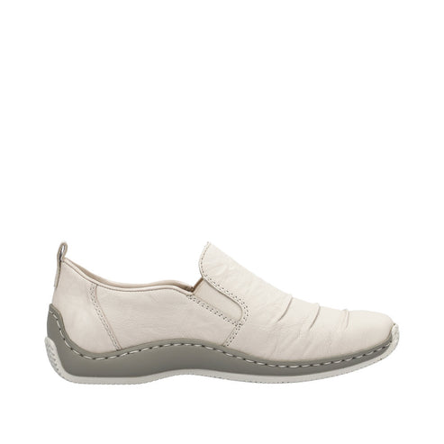 Beige slip-on shoe with a gray sole.