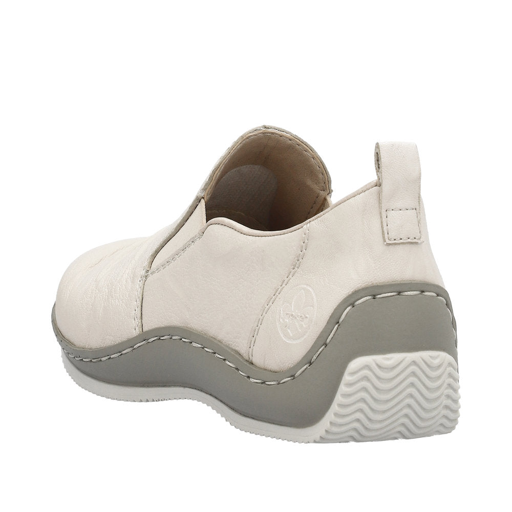 Off-white slip-on shoe with a gray sole and heel pull tab.