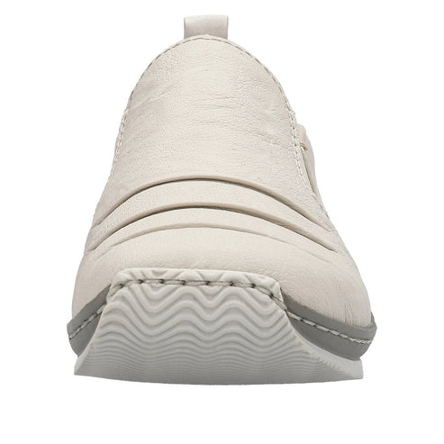 Cream-colored slip-on shoe with pleated upper and textured sole.