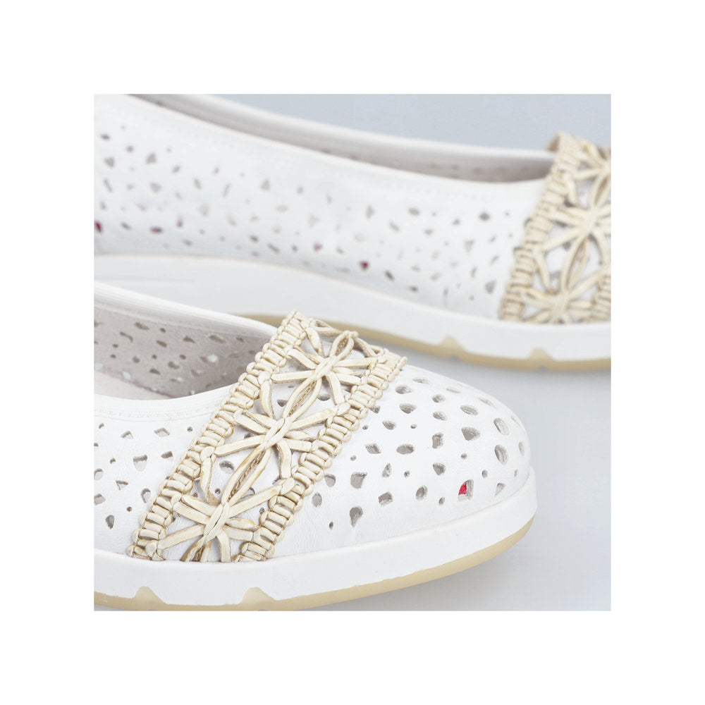 White flat shoes with cutout designs and woven band.