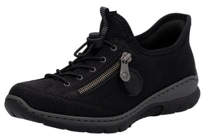 A black textured sneaker with black sole, elastic laces and side zipper.