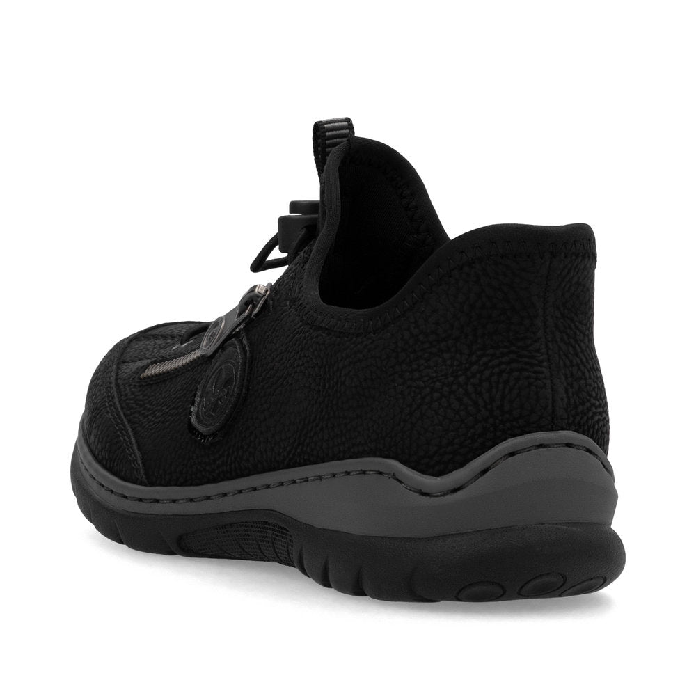 Black slip-on shoe with a drawstring and textured upper.