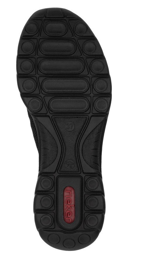 Black shoe sole with circular and rectangular treads and a visible red brand text.