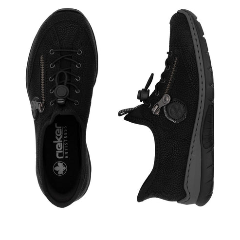 Two black sneakers with laces and zipper detail. One is facing forward and the other is at an angle.