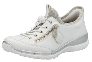 White leather sneaker with silver accents, side zipper and toggle laces.