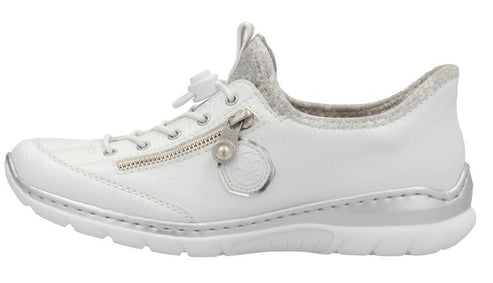 White women's sneaker with silver accents, a zipper, and a gray sock liner.