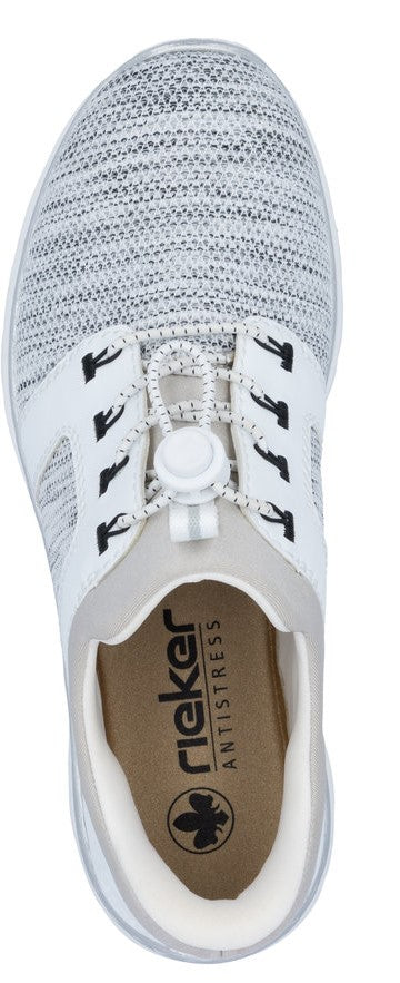 Top-down view of a white shoe with bungee-cord laces and the text 'rieker ANTISTRESS' visible on the insole.