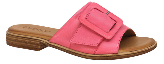 Pink slide sandal with a large buckle.