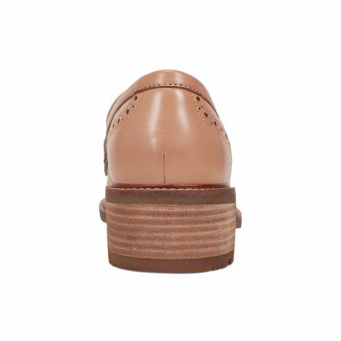Close-up of light brown leather loafer.