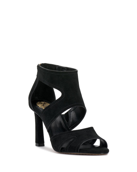 Black stiletto heel sandal with open toe and cutouts.