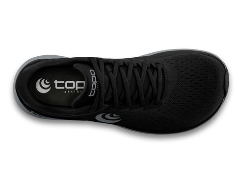 Top view of a black running shoe with gray accents and visible logo reading 'topo athletic'.