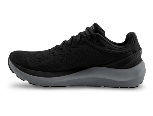 A running shoe with a black upper and a grey sole.