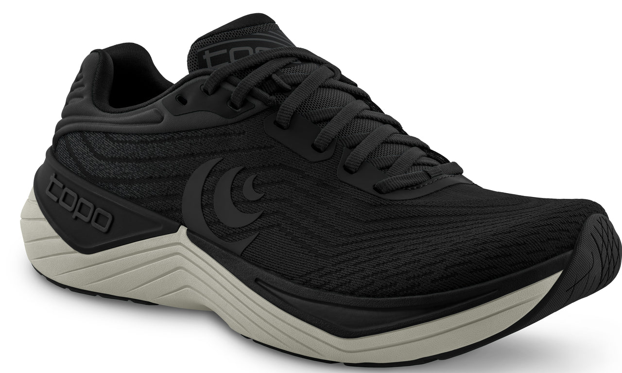 Black running shoe with off-white sole, lace-up, and visible logo.