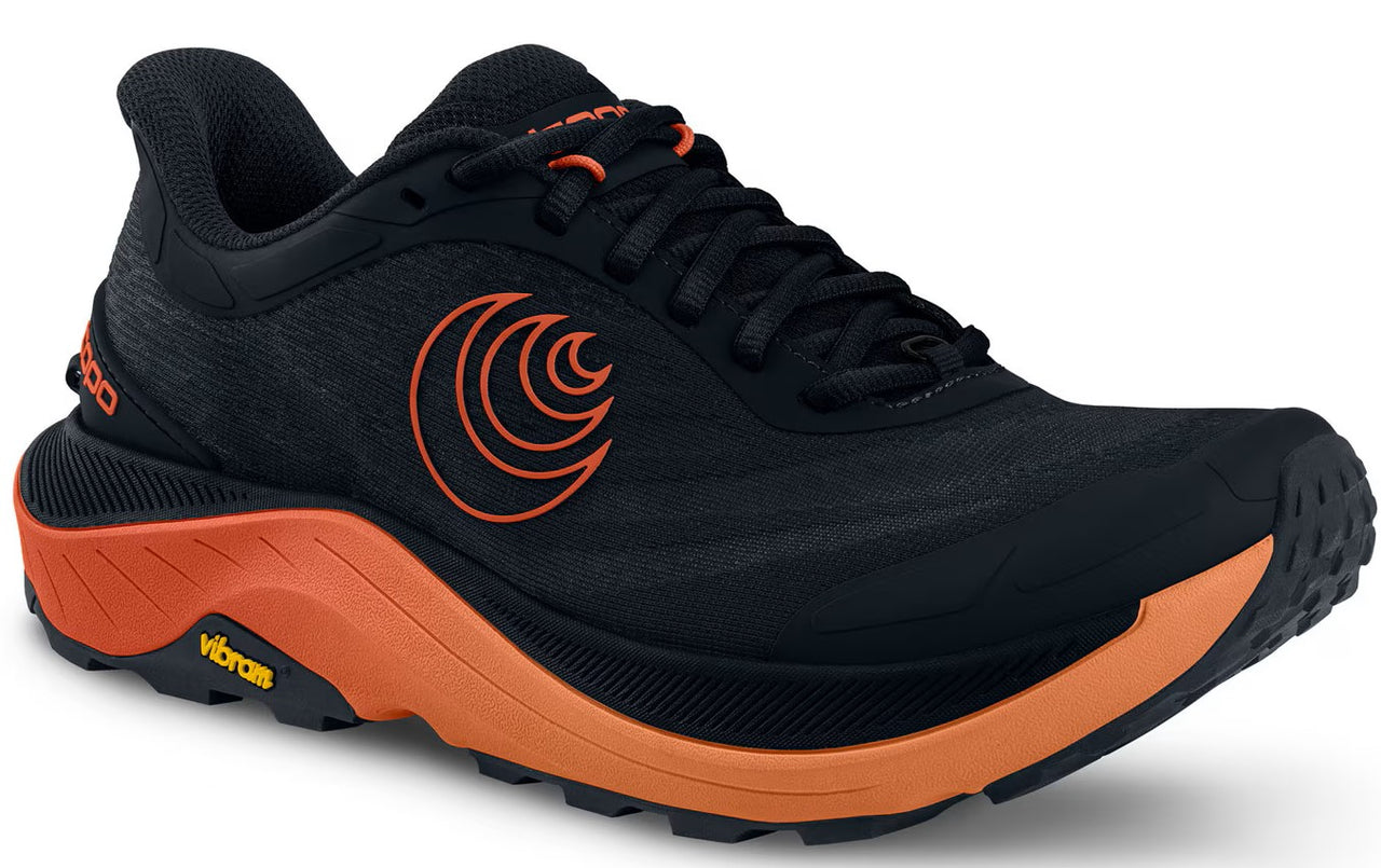 Black trail running shoe with an orange sole and logo.
