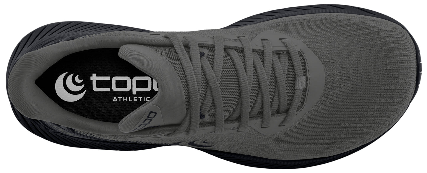 A gray running shoe featuring laces and a black sole.