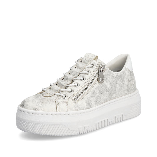 Low top white sneaker with silver zipper detail and white platform sole.