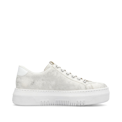 White low-top sneaker with a thick white sole and white laces.