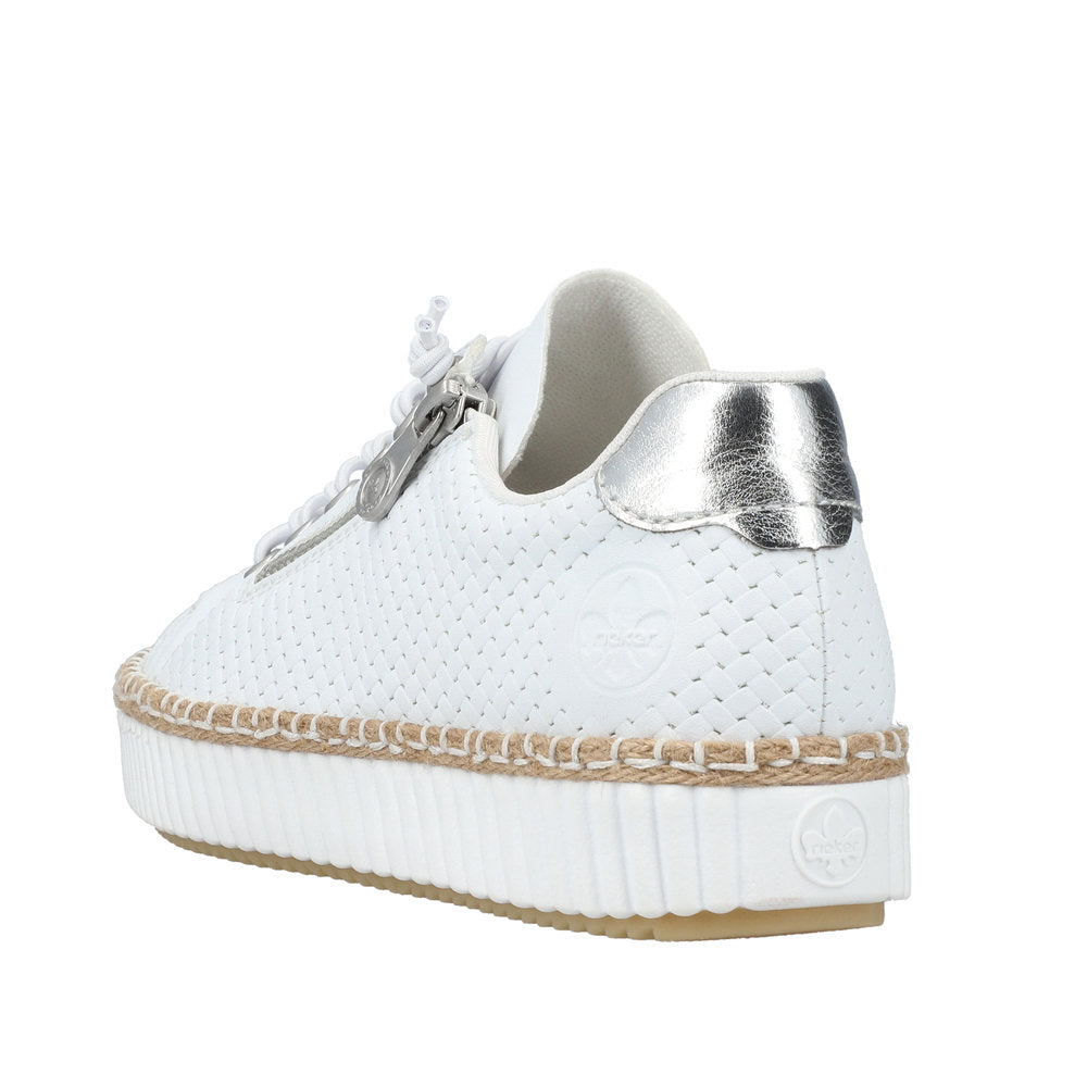 A white perforated sneaker with silver heel, and tan-trimmed platform sole.