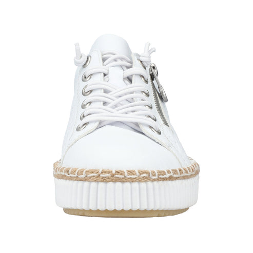 Front-facing view of white sneaker with laces and decorative sole.