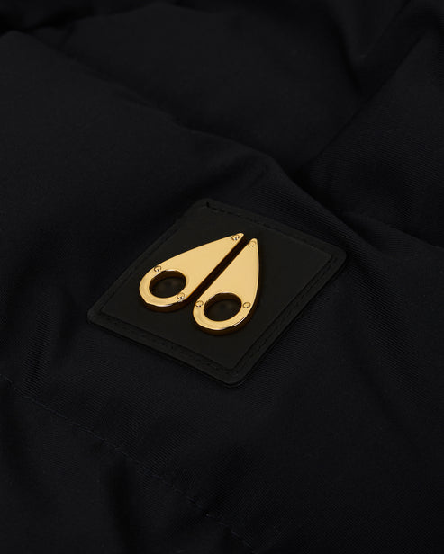 Black square patch with gold-colored metal clasps.