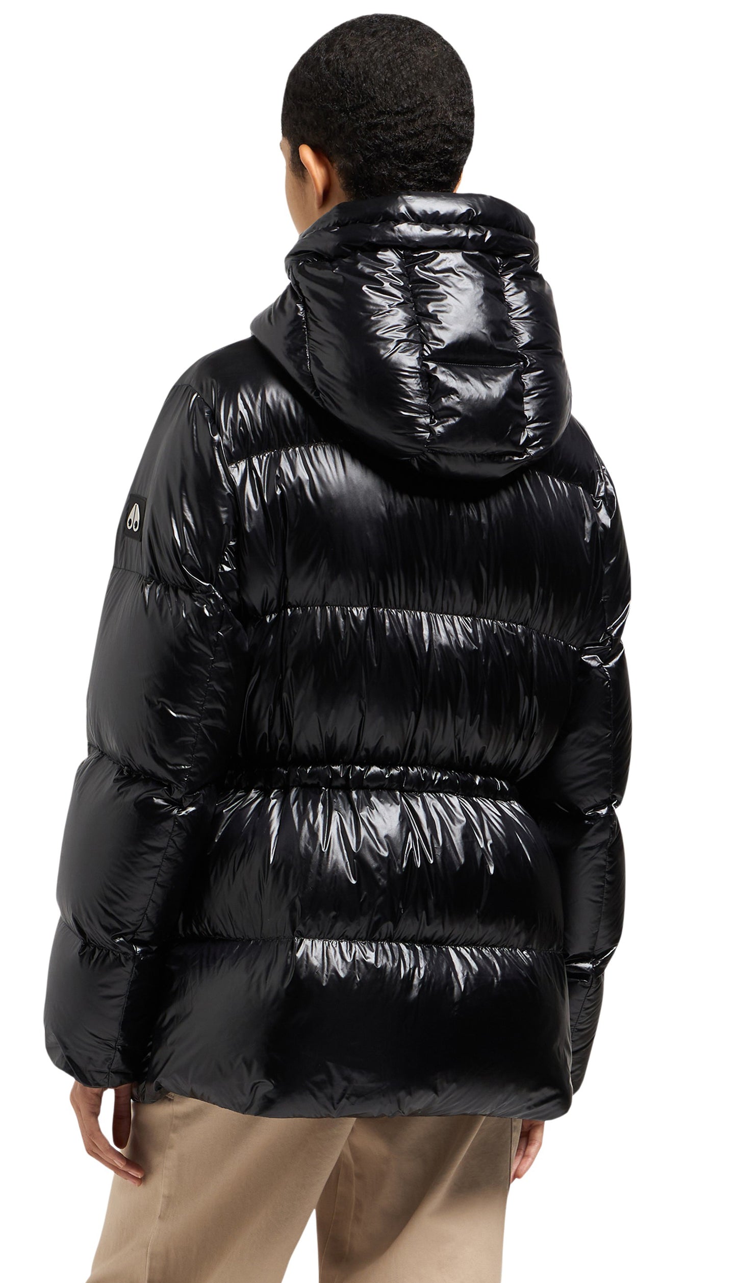 Back view of a shiny black puffer jacket with a hood.