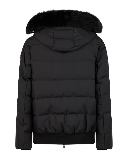 Back view of a black, quilted down bomber jacket with a fur-trimmed hood.