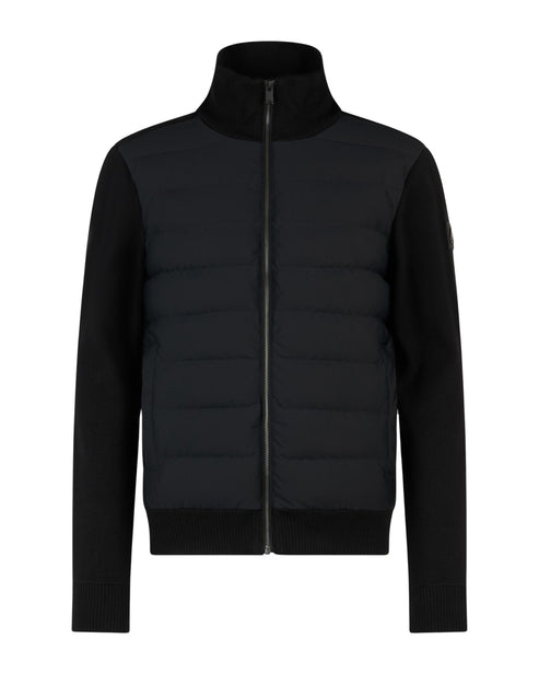 Black zip-up jacket with quilted front and knit sleeves.