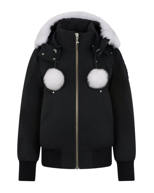 Black bomber jacket with white fur hood and pom-poms.
