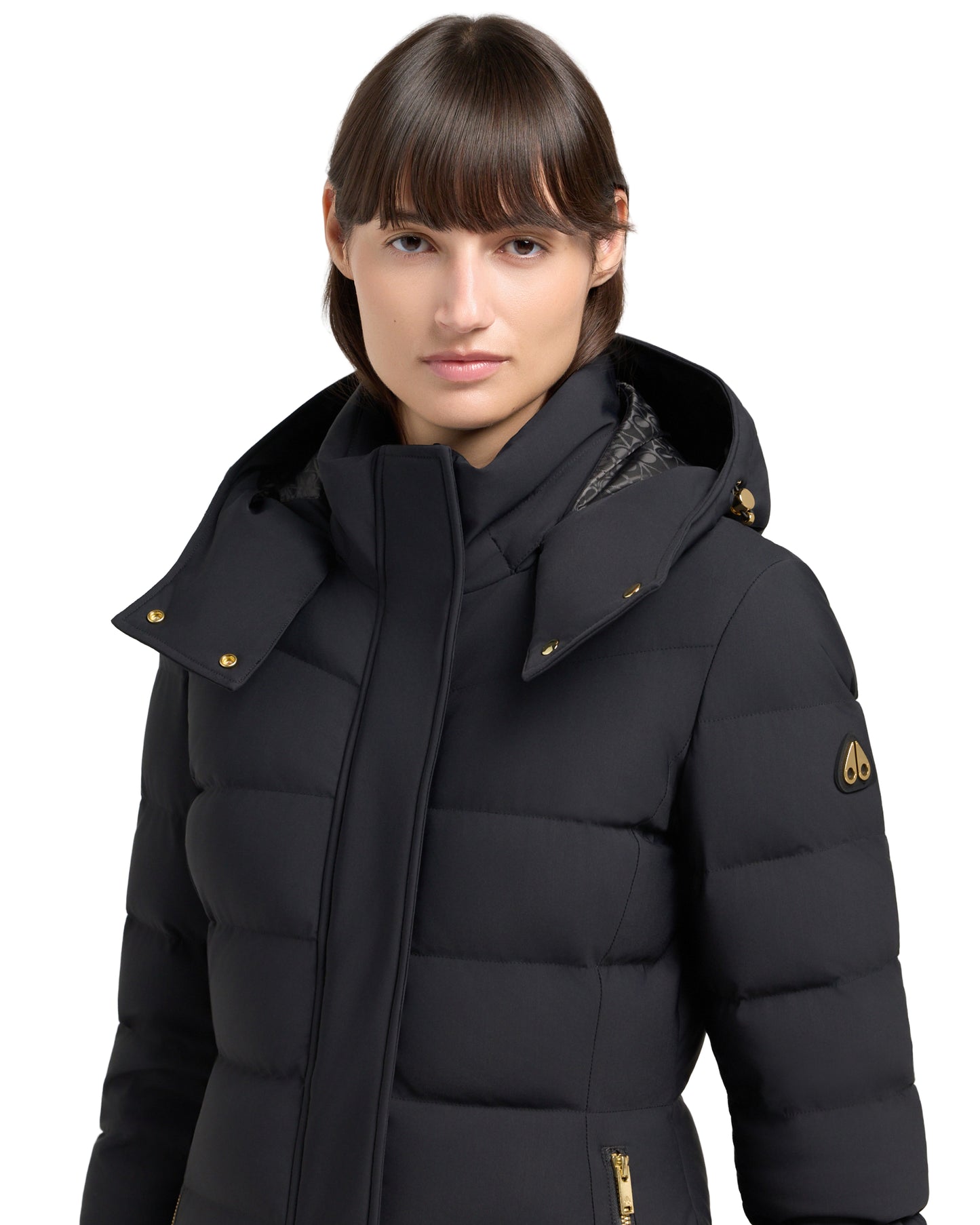 Black padded hooded jacket on a person