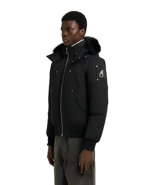A black bomber jacket with a fur-trimmed hood.