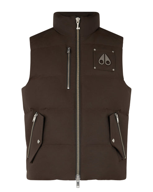 A brown puffer vest with zippered pockets and a logo patch.
