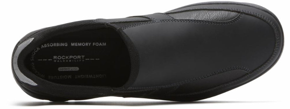 Black slip-on shoe with SHOCK ABSORBING MEMORY FOAM, ROCKPORT text on insole.