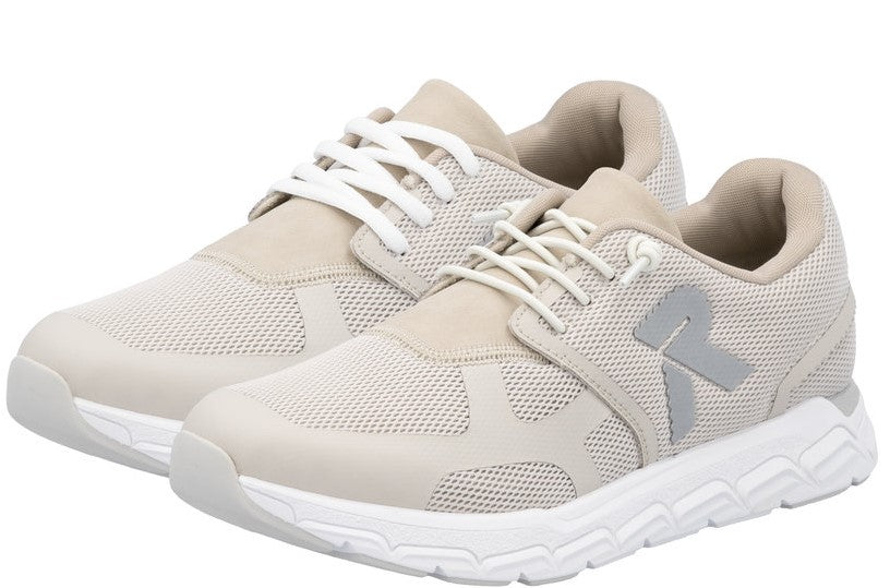 Pair of tan mesh running shoes with white laces and soles.