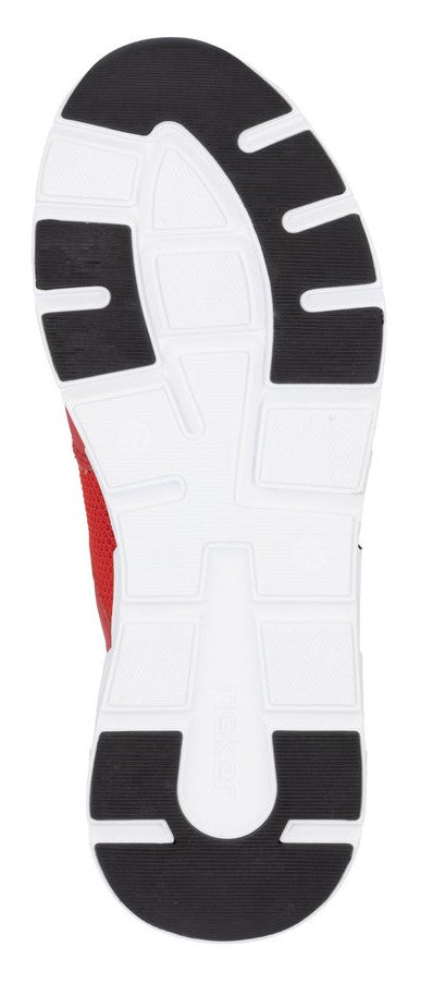 The sole of a shoe with black and white color blocking.