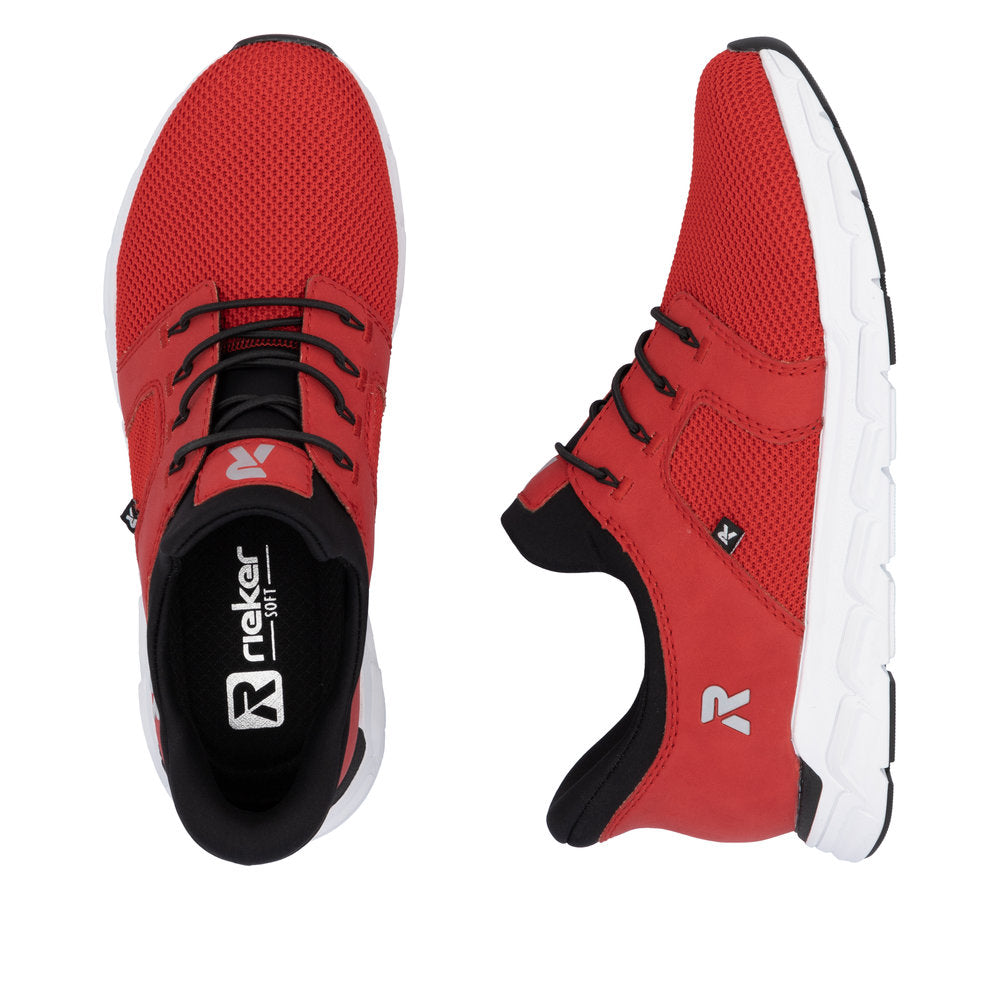 Pair of red sneakers with black laces and white soles; the left shoe shows the insole with the text 'Rieker J141'.