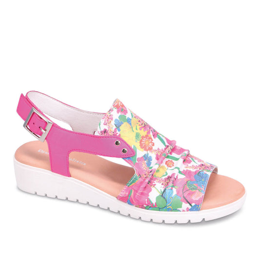 Floral print sandal with pink strap and white sole.