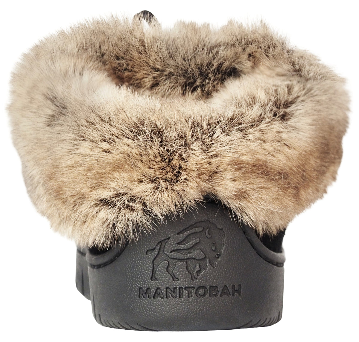 Rear view of a black winter boot featuring a thick, fluffy, brown-and-tan faux fur collar and a debossed buffalo logo above the embossed text MANITOBAH on the heel.
