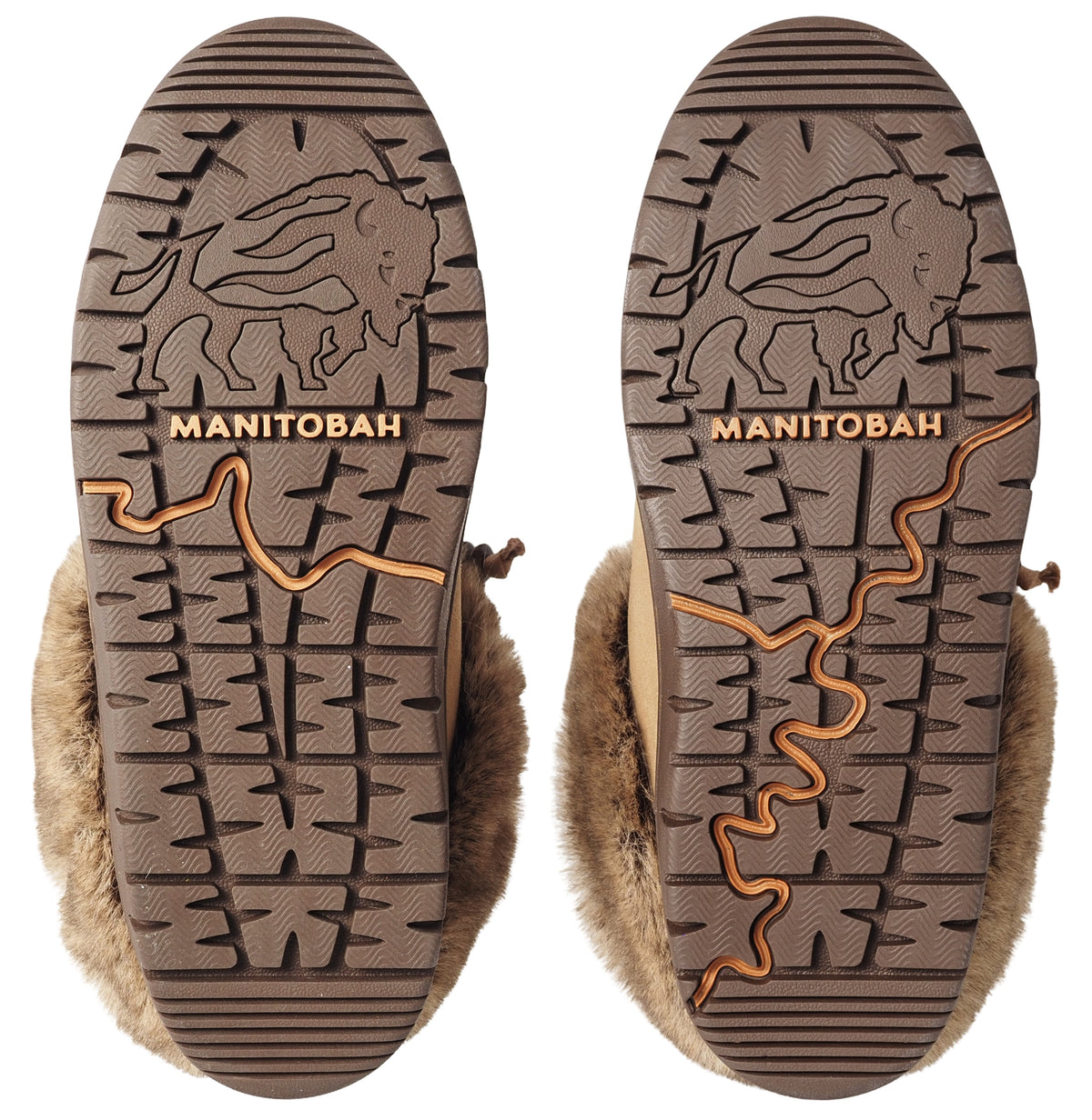 A pair of brown winter boot outsoles featuring a rugged tread pattern with a prominent buffalo design and the embossed text MANITOBAH above an integrated, winding map-like decorative groove.