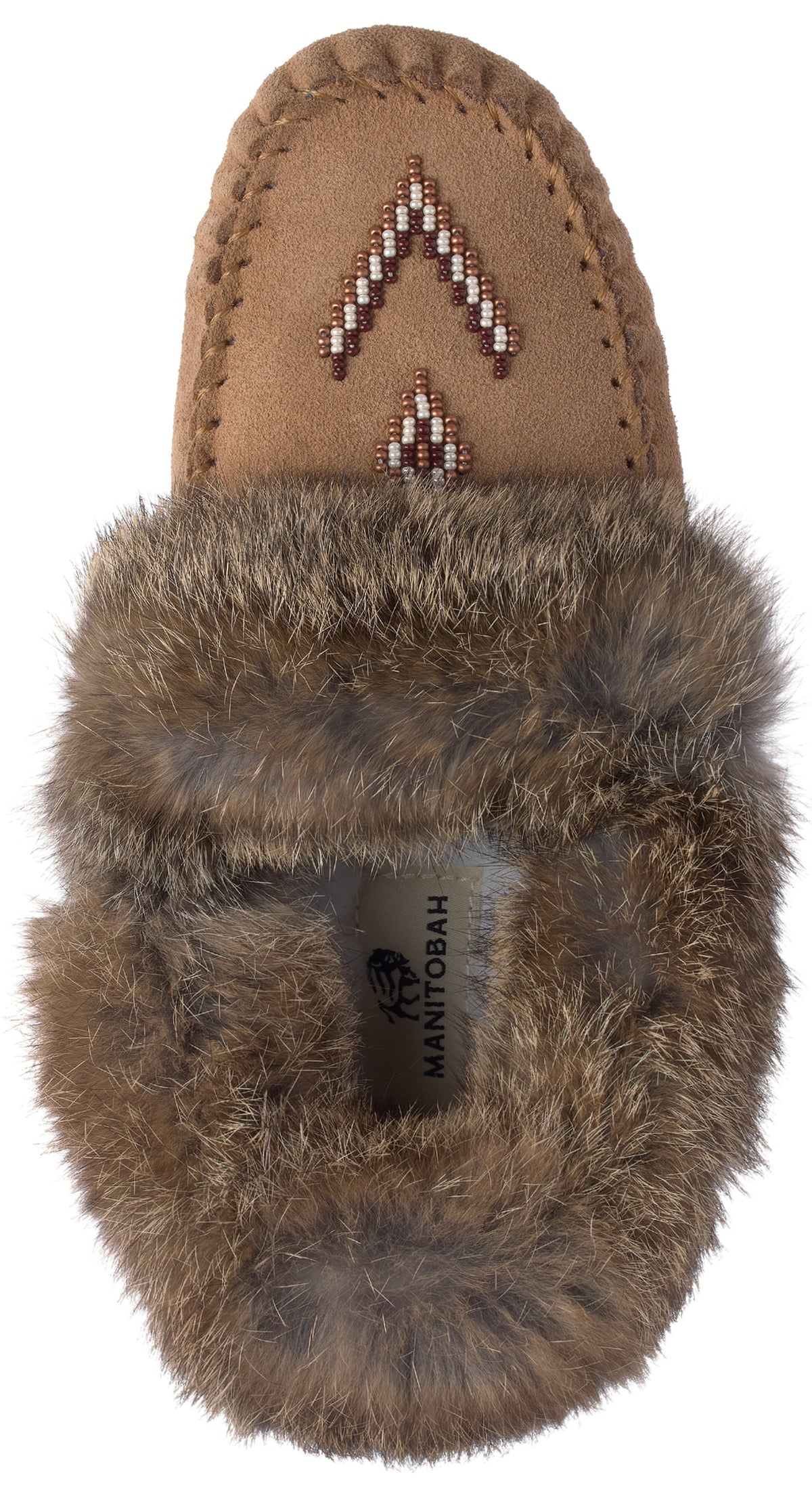 A tan suede moccasin slipper from a top-down view, featuring a fur-lined collar and a beaded arrow design on the toe, with 'MANITOBAH' printed on the insole.