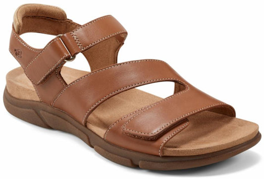 Brown leather sandal with velcro straps.