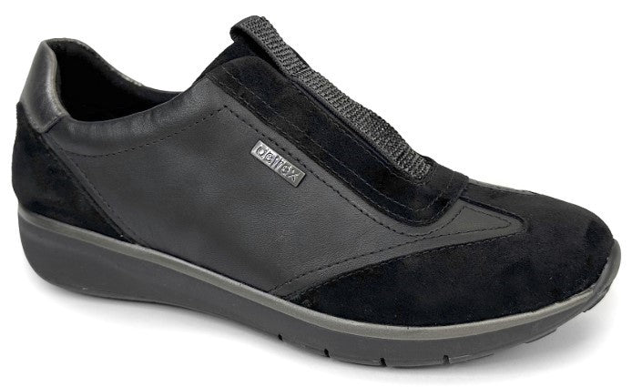 Black slip-on shoe with leather and suede details and a metallic 'Dortex' logo.