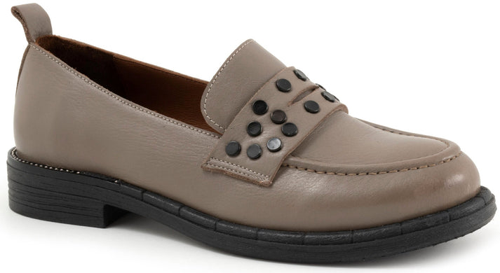 Taupe loafer with a wide band decorated with dark studs.